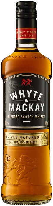 На фото изображение Whyte & Mackay Triple Matured, 0.7 L (Уайт энд Маккей Трипл Мейчуред в бутылках объемом 0.7 литра)
