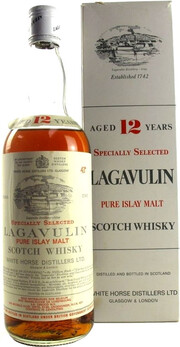 На фото изображение Lagavulin 12 years Special Release, 0.7 L (Лагавулин 12 лет специальный выпуск, в коробке в бутылках объемом 0.7 литра)