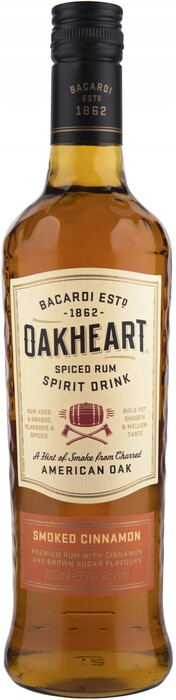 На фото изображение Bacardi Oakheart Smoked Cinnamon, 0.7 L (Бакарди Оакхарт Смоукт Циннамон объемом 0.7 литра)