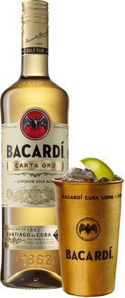 На фото изображение Bacardi Carta Oro, with metal cup, 0.7 L (Бакарди Карта Оро, с металлическим стаканом объемом 0.7 литра)