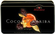 In the photo image Hachez, Bitter Chocolade Blatter Orange, 77% Cacao, metal box, 150 g